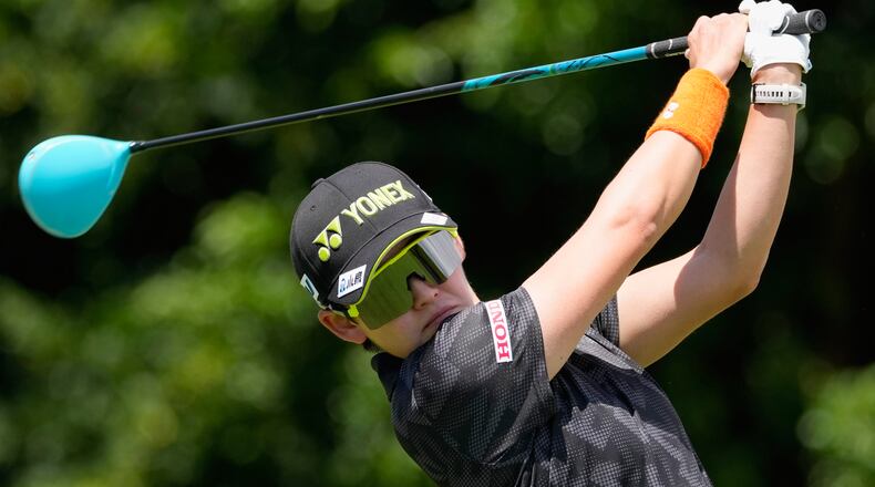 Aki Iwai, of Japan, drives from the 10th tee during the second round of the Women's PGA Championship golf tournament, Friday, June 26, 2026, in Chaska, Minn. (AP Photo/Chris Carlson)