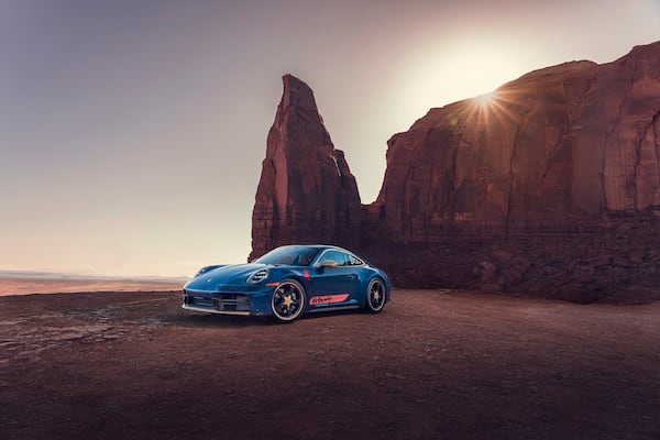 The Woody-inspired Porsche 911 Carrera T has a denim-like paint finish mimicking the wear of his jeans and a vintage-inspired leather interior. (Courtesy of Porsche Cars North America)