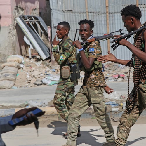 Somali soldiers patrol a street after supporters of opposition political figures and state security forces clashed in Mogadishu, Somalia, Thursday, June 4, 2026. (AP Photo/Farah Abdi Warsameh)