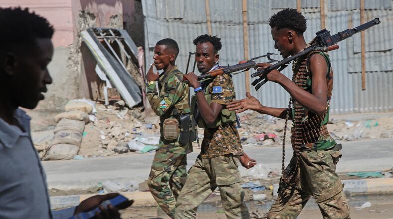 Somali soldiers patrol a street after supporters of opposition political figures and state security forces clashed in Mogadishu, Somalia, Thursday, June 4, 2026. (AP Photo/Farah Abdi Warsameh)