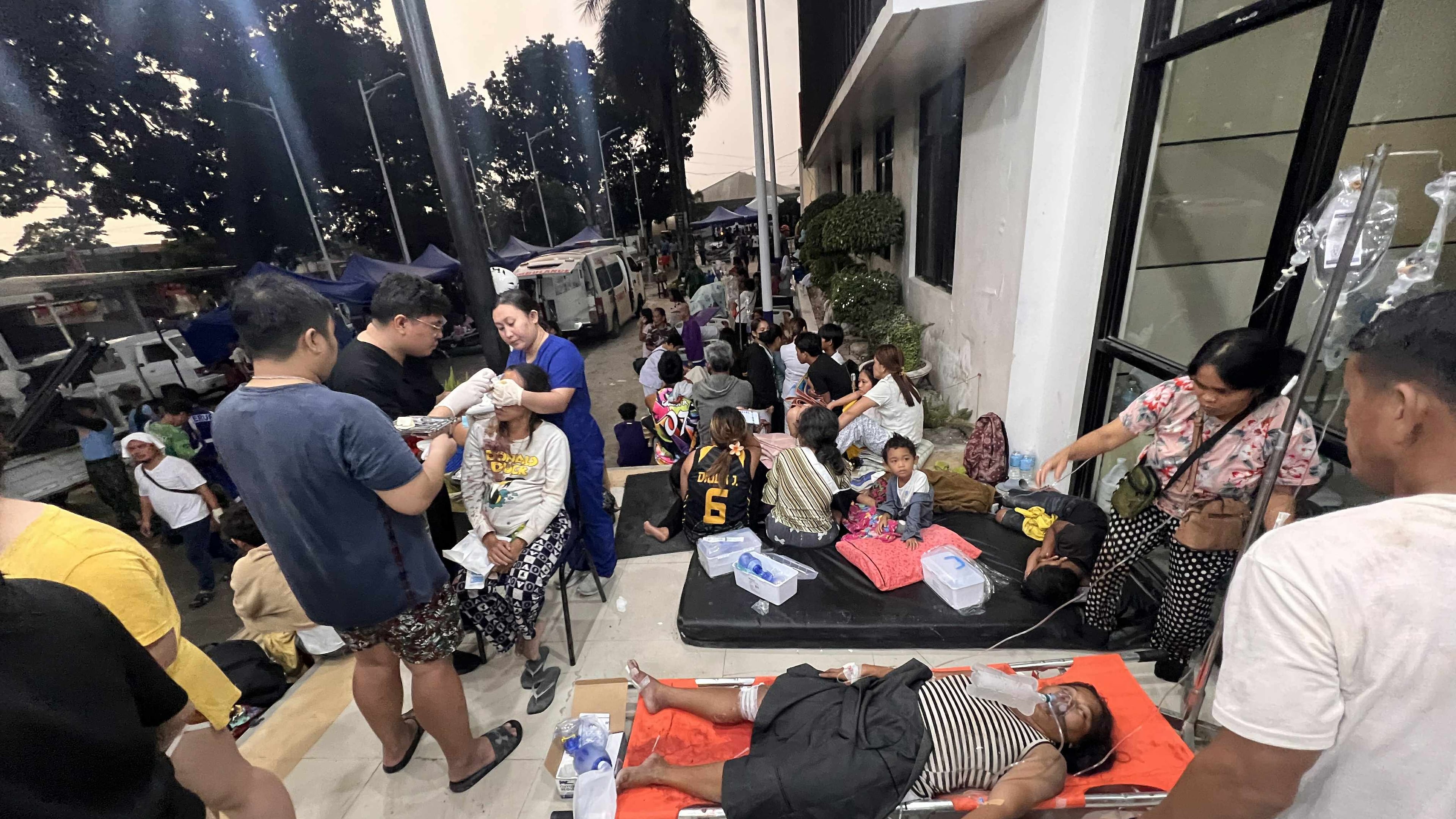 Patients wait outside the Cebu Provincial Hospital Bogo City after a strong earthquake struck in Bogo city, Cebu province, central Philippines, Wednesday Oct. 1, 2025. (AP Photo)