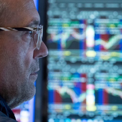 Specialist Anthony Matesic works on the floor of the New York Stock Exchange in New York, Friday, Aug. 21, 2026. (AP Photo/Yuki Iwamura)