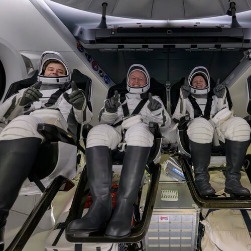 Roscosmos cosmonaut Oleg Platonov, left, NASA astronauts Mike Fincke, Zena Cardman, and JAXA (Japan Aerospace Exploration Agency) astronaut Kimiya Yui are seen inside the SpaceX Dragon Endeavour spacecraft onboard the SpaceX recovery ship SHANNON shortly after having landed in the Pacific Ocean off the coast of Long Beach, Calif., Thursday, Jan. 15, 2026. (NASA via AP)