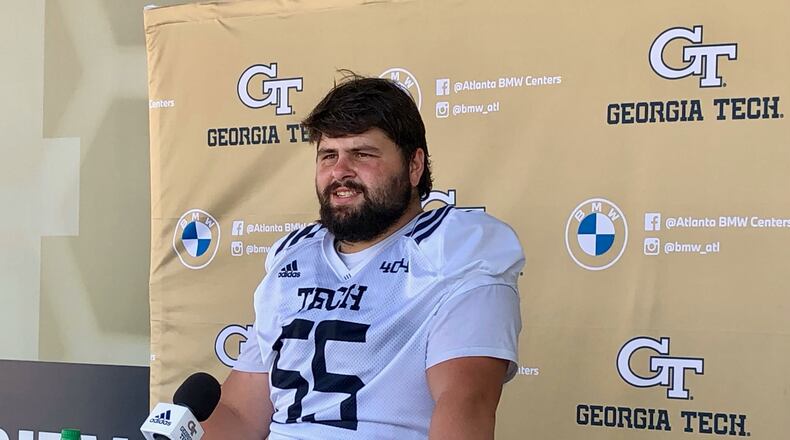 Georgia Tech offensive lineman Kenny Cooper speaks with media after a preseason practice August 13, 2021 at Bobby Dodd Stadium. (AJC photo by Ken Sugiura)