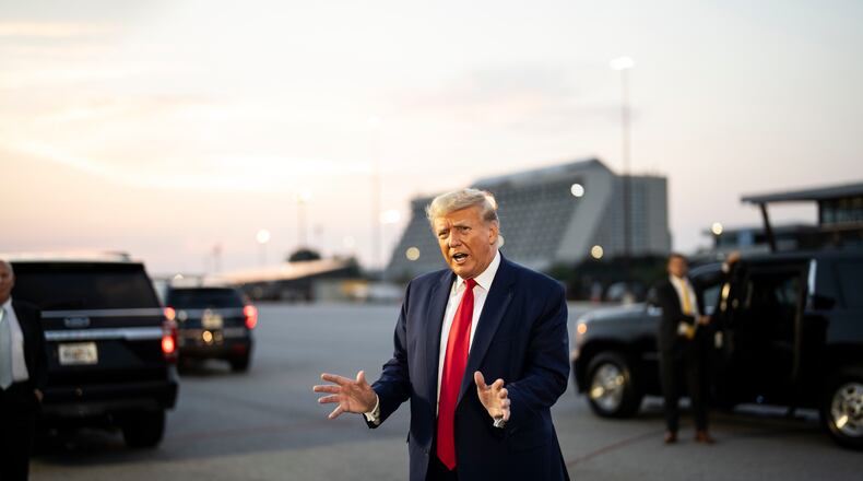 FILE — Former President Donald Trump delivering remarks at the airport in Atlanta after being booked at the Fulton County Jail, where he and 18 allies were charged in Georgia election meddling, on Aug. 24, 2023. A lawsuit filed by six Colorado voters on Wednesday, Sept. 6, 2023 demands that the Colorado secretary of state not print former Trump’s name on the Republican primary ballot. (Doug Mills/The New York Times)