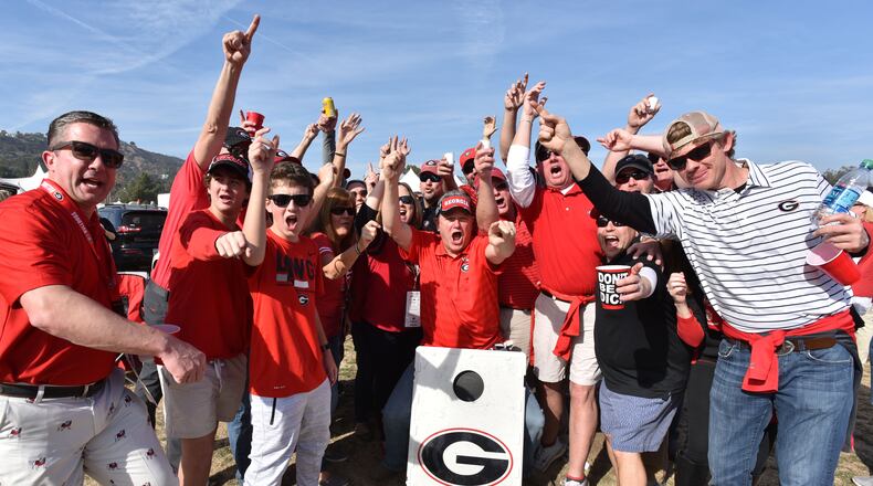 January 1, 2018 Pasadena, California - Georgia fans tailgate outside the Rose Bowl Stadium before the College Football Playoff Semifinal between Georgia and Oklahoma on Monday, January 1, 2018. Hyosub Shin / hshin@ajc.com