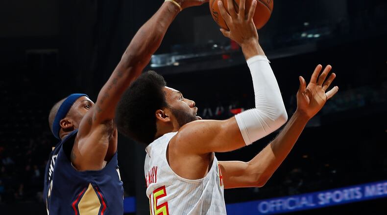 DeAndre Bembry of the Atlanta Hawks drives to the basket in a game against the New Orleans Pelicans at Philips Arena on November 22, 2016 in Atlanta, Georgia. (Photo by Kevin C. Cox/Getty Images)