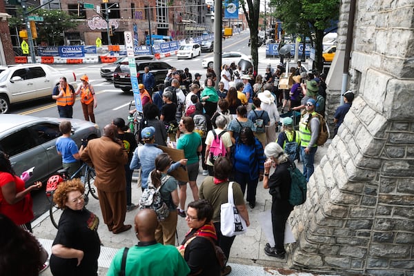 People gather outside of Big Bethel AME Church before the Pilgrimage for Voting Rights through downtown Atlanta on Wednesday, June 17, 2026. (Abbey Cutrer/AJC)