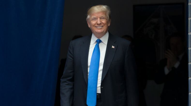 WASHINGTON, DC - JUNE 09: US President Donald Trump arrives before delivering remarks on infrastructure investment and deregulation at the Department of Transportation on June 9, 2017 in Washington, DC. (Photo by Michael Reynolds-Pool/Getty Images)