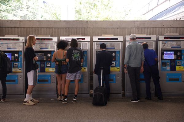 Riders at the MARTA North Springs station by Breeze cards Sept. 24, 2025. (Natrice Miller/AJC 2025)