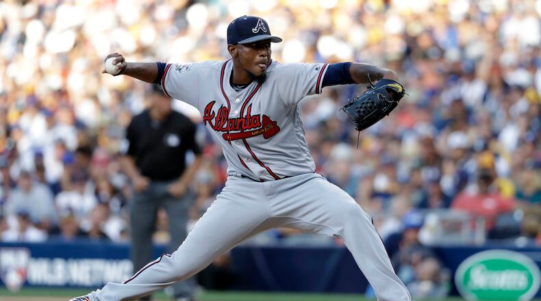 National League's Julio Teheran, of the Atlanta Braves, throws during the MLB baseball All-Star Game, Tuesday, July 12, 2016, in San Diego. (AP Photo/Gregory Bull)