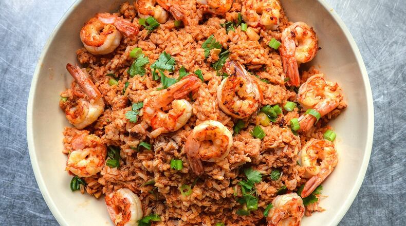 Red Rice with Butter Fried Shrimp and Herbs STYLING BY WENDELL BROCK. CONTRIBUTED BY CHRIS HUNT