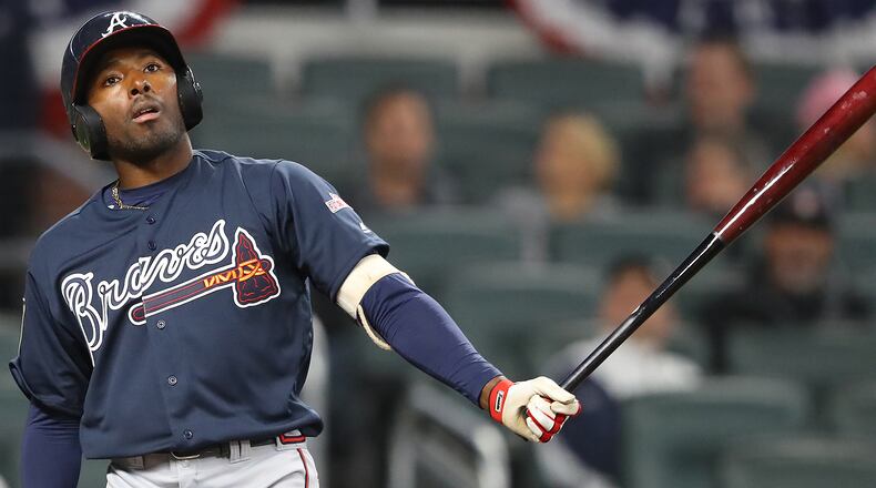 Braves infielder Travis Demeritte reacts to a pitch while batting during the Future Stars Exhibition Game on Tuesday, March 27, 2018, at SunTrust Park in Atlanta.