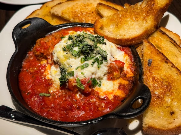Cooper's Hawk in Alpharetta serves an excellent meatball appetizer. (Henri Hollis/AJC)