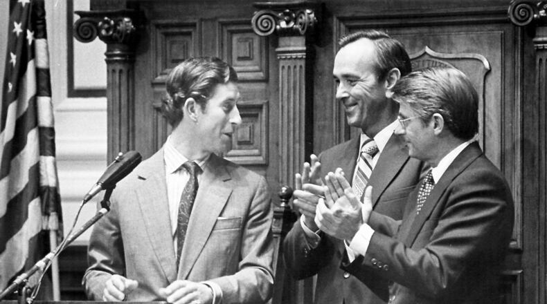 771022 - Atlanta, Georgia - Prince Charles draws applause from Gov. George Busbee and Lt. Gov. Zell Miller at the State Capitol, Oct. 21, 1977. (AJC Staff Photo/Minla Shields