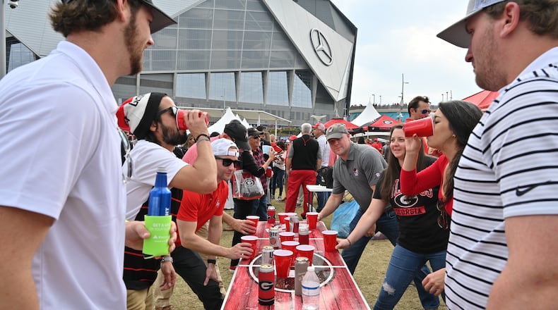 Home Depot will become an official corporate sponsor of the National Collegiate Athletics Association, which will give the company rights to promote itself during 90 championships, starting with the March Madness of the basketball competitions. The company previously focused on football, like this 2021 conference champsionship where fans tailgated at The Home Depot Backyard outside Mercedes-Benz Stadium. (Hyosub Shin / Hyosub.Shin@ajc.com)