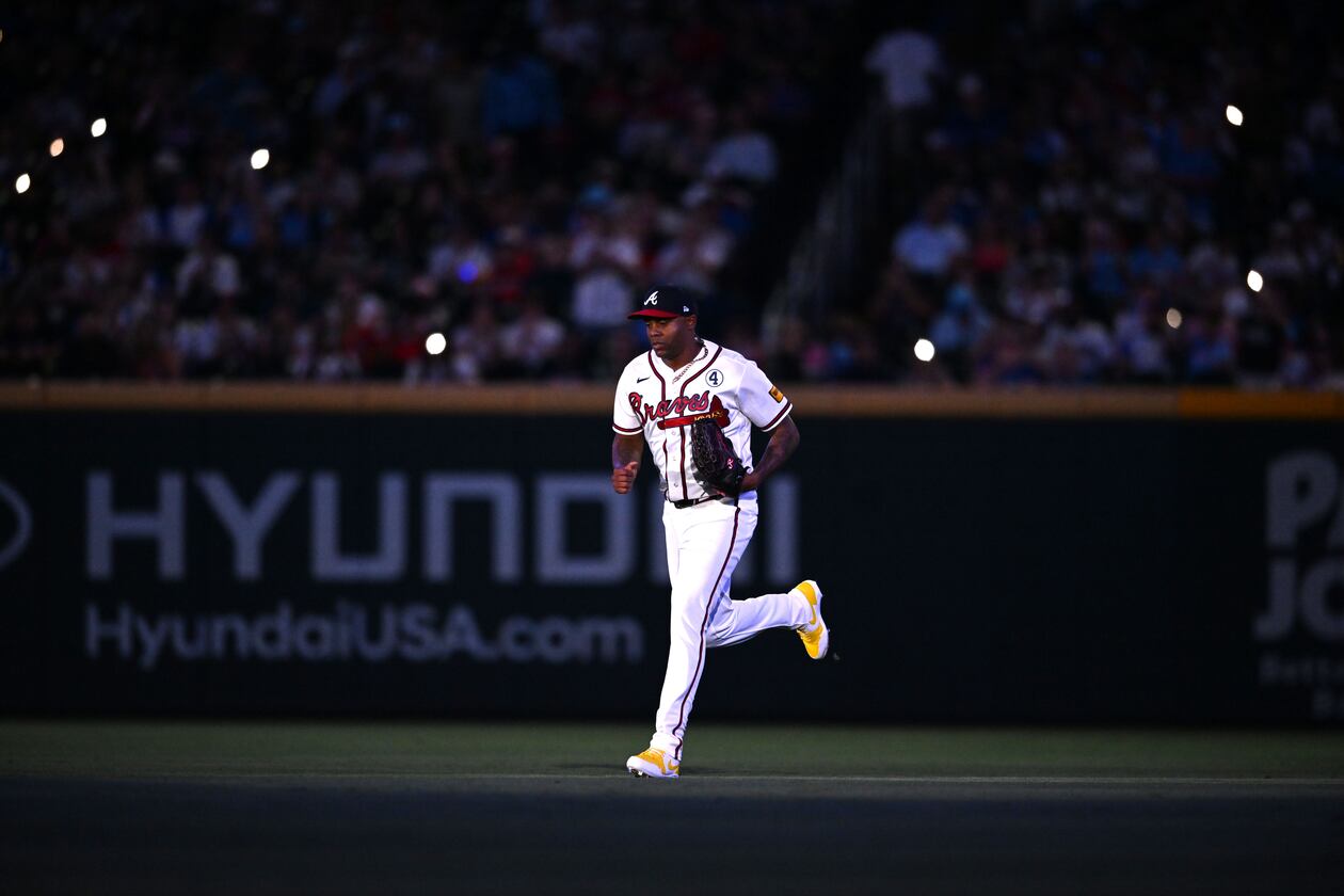 Atlanta Braves pitcher Raisel Iglesias (26) runs onto the baseball filed during the ninth inning of a baseball game at Truist Park, Tuesday, June 2, 2026, in Atlanta. Atlanta Braves won 4-3 over Toronto Blue Jays. (Hyosub Shin/AJC)