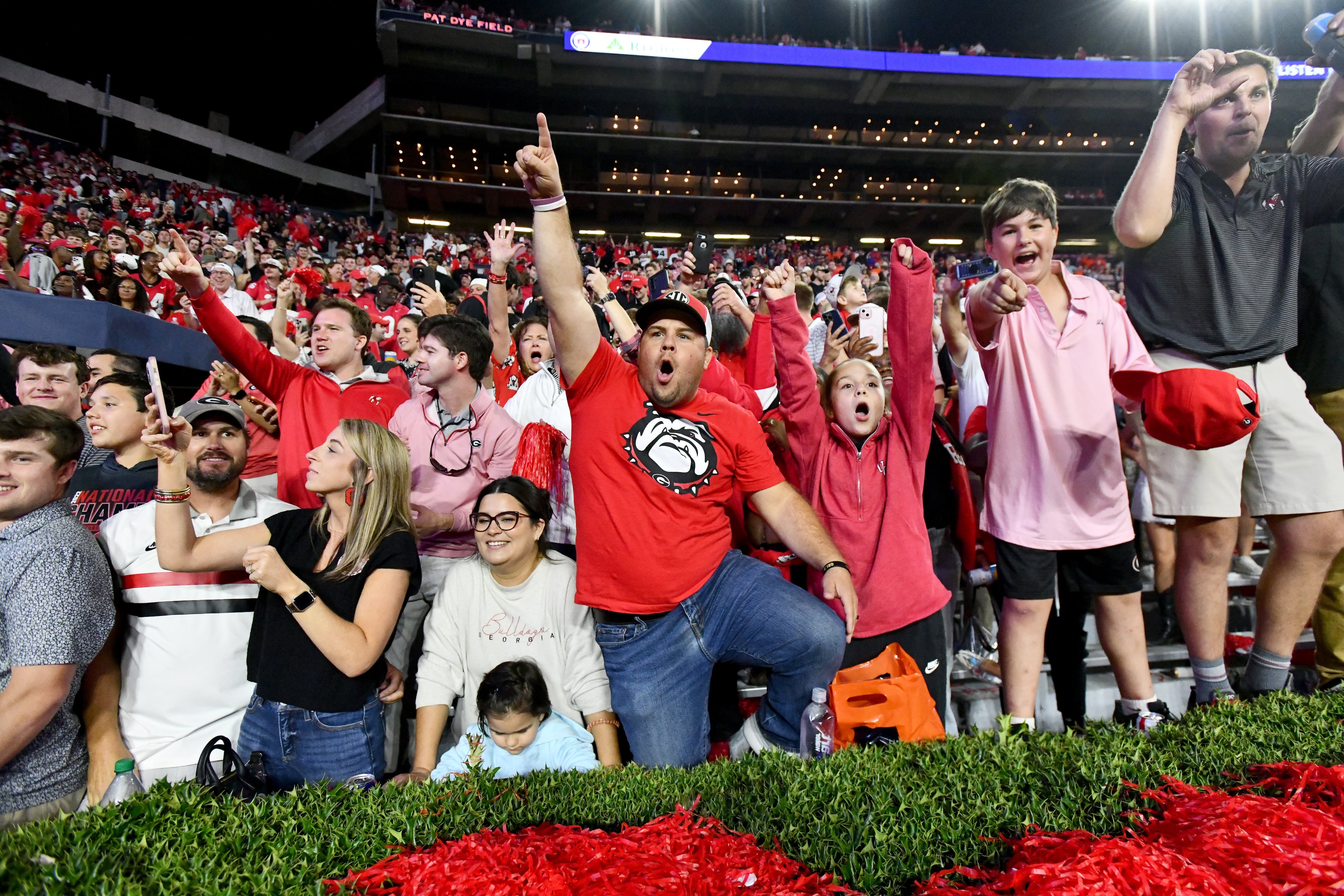 Georgia fans cheer after Georgia beat Auburn during a NCAA college football game at Jordan-Hare Stadium, Saturday, October 11, 2025, in Auburn, Ala. Georgia won 20-10 overAuburn. (Hyosub Shin / AJC)