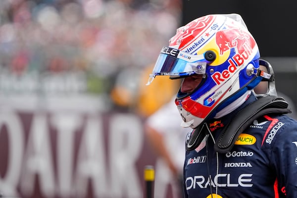 Red Bull driver Max Verstappen of the Netherlands celebrates his pole position after the qualifying session at the Silverstone racetrack, ahead of the British Formula One Grand Prix, in Silverstone, England, Saturday, July 5, 2025. (AP Photo/Darko Bandic)