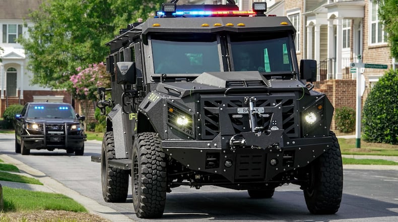 A woman claims she was slammed against a wall and shot in the stomach with a rubber bullet while volunteering as a citizen role player for a North Fulton SWAT training exercise in September 2022. She says in a lawsuit against the cities of Roswell, Milton and Alpharetta that she was given a helmet but no other protective gear and was not warned that she could be physically injured during the exercise. (Photo: Ben Hendren)
