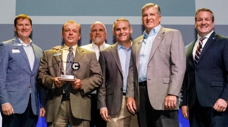 CROFT & Associates has been chosen the top small business by the Cobb Chamber. Among those at the May 10 awards ceremony were (l-r) Cobb Chamber President and CEO Sharon Mason, CROFT Senior Vice President/Quality Anthony Iorillo Sr., CROFT President Jim Croft, CROFT Director of Human Resources Tim Clement, CROFT Vice President/Director of Federal Ed Setzler, CROFT Chief Operating Officer Mark Jackson and 2021 Cobb Chamber Chairman/owner of LOUD Security Systems Inc. John Loud. (Courtesy of Cobb Chamber)