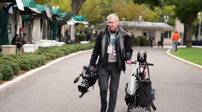 CNN Senior Photojournalist and contributing Producer Peter Morris, arrives on the White House grounds, Thursday, Sept. 24, 2026, in Washington. (AP Photo/Mark Schiefelbein)