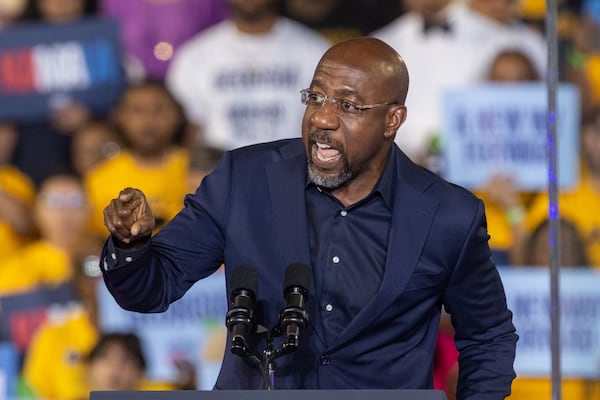 U.S. Sen. Raphael Warnock, D-Ga., speaks during Democratic presidential candidate Kamala Harris’ rally at James R. Hallford Stadium in Clarkston on Thursday, Oct. 24, 2024. (Arvin Temkar/AJC)