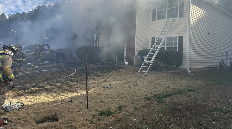 The fire happened at the home on Baywood Crossing that belongs to a Hiram police officer, officials said. (Paulding County Fire Rescue)