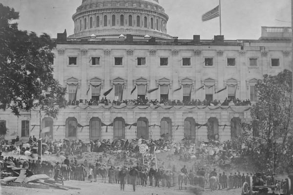 People watch from the U.S. Capitol, during the grand review of the great veteran armies of Grant and Sherman on May 23-24, 1865, in Washington. (Matthew Brady/Library of Congress via AP)
