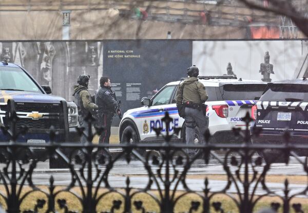 Canadian police investigate an incident at Parliament Hill in Ottawa, Ontario, Saturday April 5, 2025. (Spencer Colby/The Canadian Press via AP)
