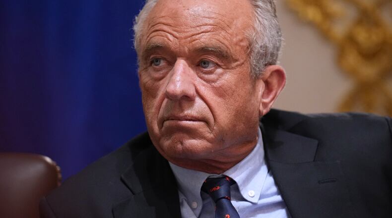Secretary of Health and Human Services Robert F. Kennedy Jr., listens during a Cabinet meeting at the White House, Wednesday, May 27, 2026, in Washington. (AP Photo/Jacquelyn Martin)