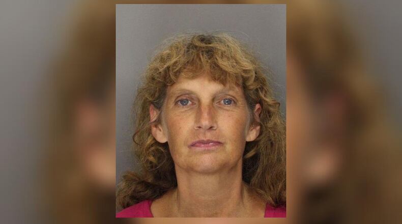 The body of 57-year-old Kelley Albertson was found near the intersection of Bells Ferry Road and Cobb Parkway.