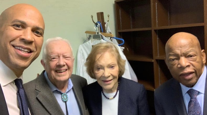 U.S. Sen. Cory Booker poses with Jimmy and Rosalynn Carter and Rep. John Lewis on his Instagram account.