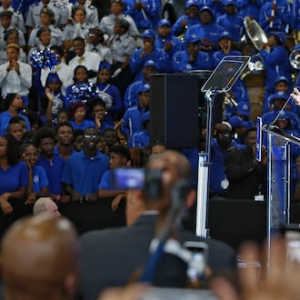 Michelle Obama visited Booker T. Washington High School as part of her “Reach Higher” campaign to increase the number of college graduates. The public high school in Atlanta has more than three times the students living in poverty and hundreds of open seats, writes guest contributor Raymond Pierce. (Bob Andres/AJC 2014)