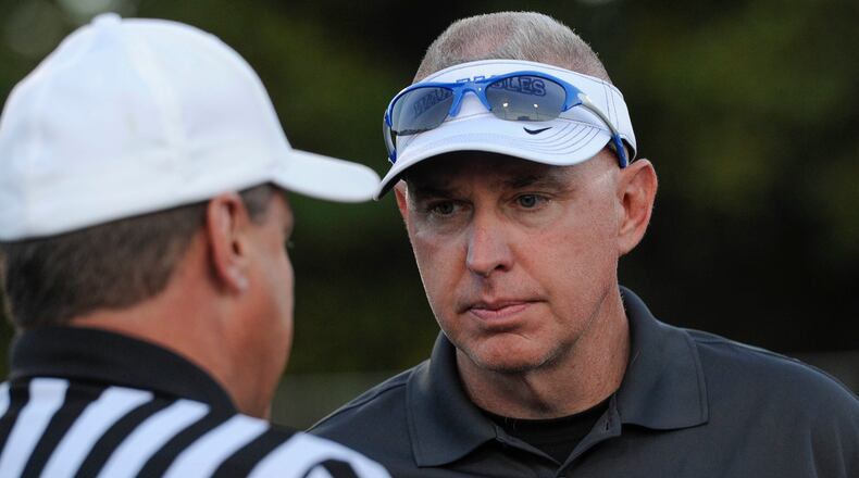 South Forsyth head coach Jeff Arnette, right, talks to a referee before the start of a game.