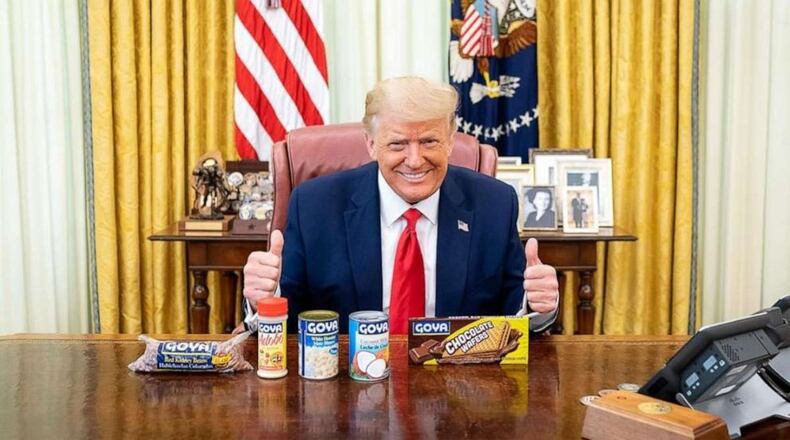 President Donald Trump on Wednesday posted to Instagram an image of himself in the Oval Office, grinning and giving two thumbs up with Goya products sitting on the Resolute Desk.