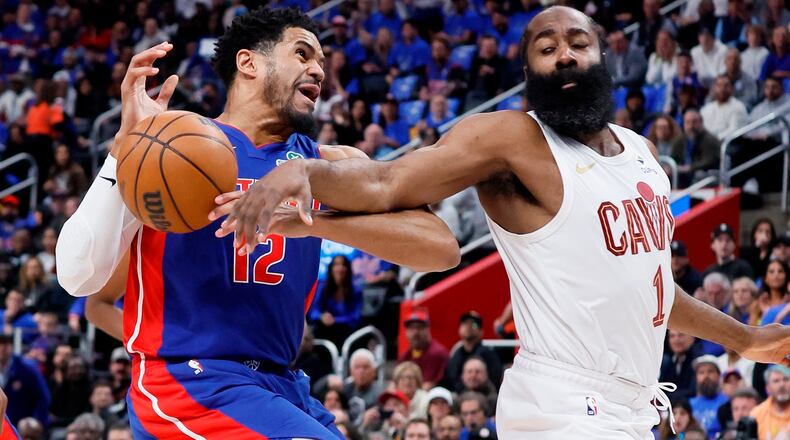 Cleveland Cavaliers guard James Harden (1) knocks the ball out of the hands of Detroit Pistons forward Tobias Harris (12) while going to the basket during the first half in Game 5 of a second-round NBA playoffs basketball series Wednesday, May 13, 2026, in Detroit. (AP Photo/Duane Burleson)