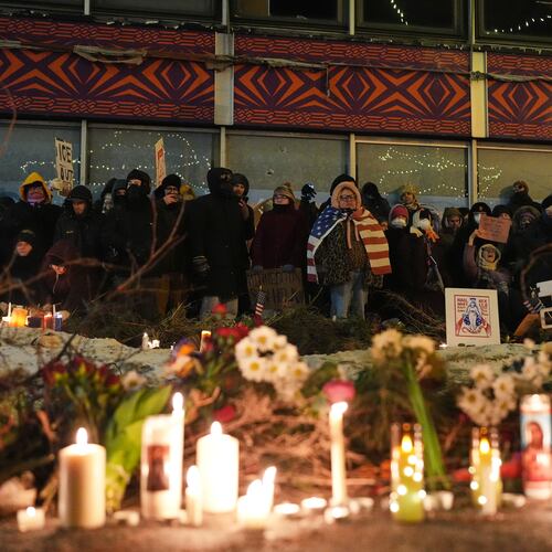 FILE - People gather during a vigil for 37-year-old Alex Pretti, who was fatally shot by a U.S. Border Patrol officer earlier in the day, Jan. 24, 2026, in Minneapolis. (AP Photo/Adam Gray, File)