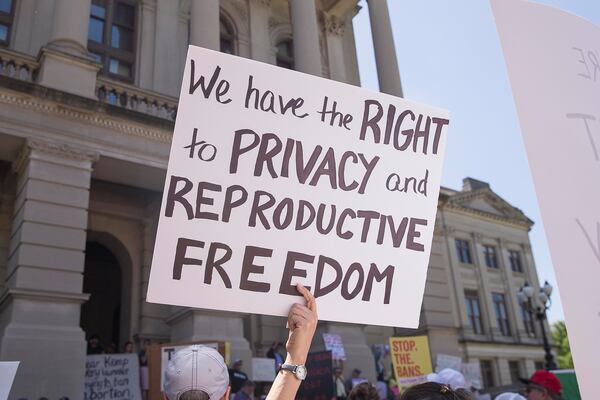 Abortion rights supporters gather on the steps of the state Capitol during a May 2019 rally. (Alyssa Pointer/AJC)