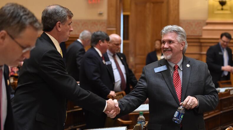 Sen Marty Harbin, R-Tyrone , left, congratulaFebruary passage of HB 757. The bill would enable faith-based organizations and individuals to opt out of serving couples -- gay, straight or unmarried – or from following anti-discrimination requirements if they cite a sincerely held religious belief. Brant Sanderlin, bsanderlin@ajc.com