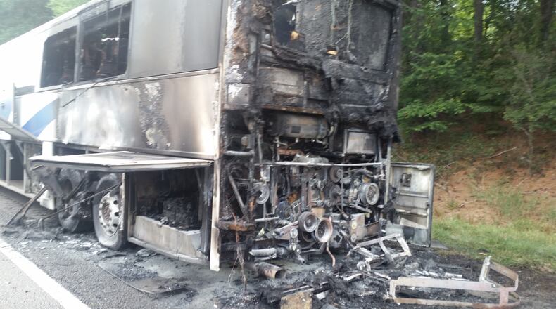 Forty-eight passengers were aboard a bus that caught fire Friday. No one was injured in the fire. (Gwinnett County Fire Department)