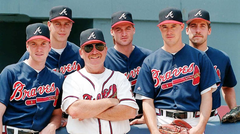 Braves pitching coach Leo Mazzone is surrounded by the Fab Five pitchers (from left) Tom Glavine, Steve Avery, Kent Mercker, Greg Maddux and John Smoltz. His job of pitching coach was made easier by the formidable starting rotation. (AJC file photo)