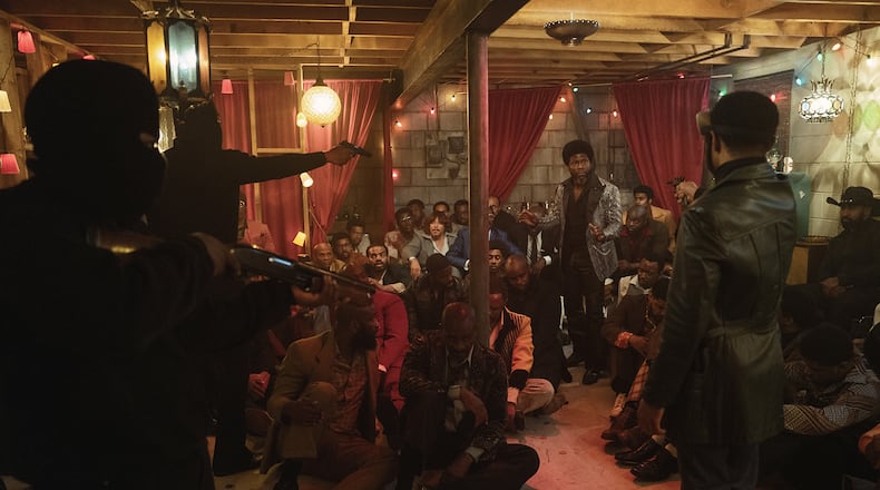 Kevin Hart, right background, as "Chicken Man" in the forthcoming Peacock Series "Fight Night."