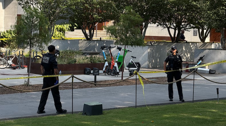 Police investigate the scene of a fatal stabbing along the Atlanta Beltline on Sunday, Aug. 23, 2026. (Megan Varner for the AJC)