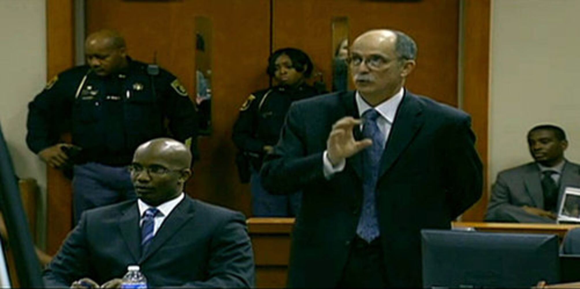 Neuman trial opens