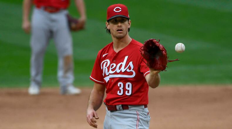 Cincinnati Reds pitcher Lucas Sims throws against the Minnesota Twins during the ninth inning of a baseball game Sunday, Sept. 27, 2020, in Minneapolis. (Craig Lassig/AP)