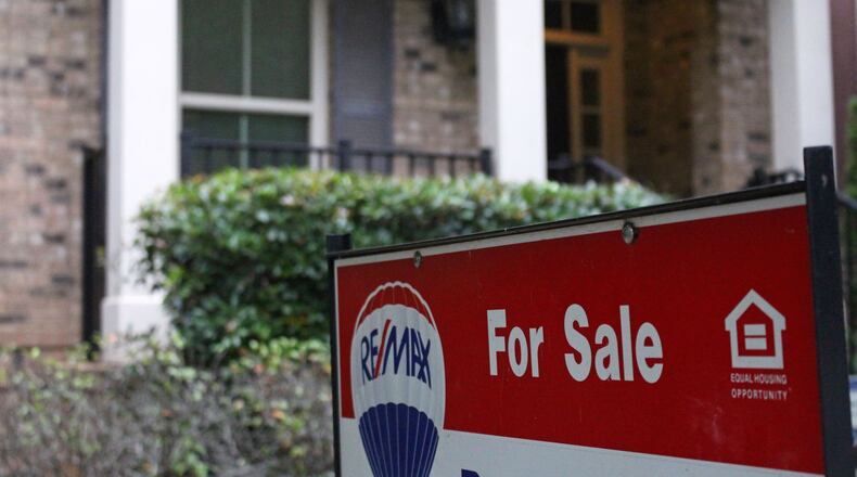 A house for sale on Ridgeview Road in Dunwoody last month. (Jenna Eason / Jenna.Eason@coxinc.com)