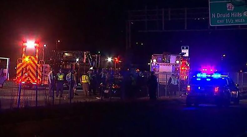 Officials investigate a deadly car chase Friday, Feb. 26, 2016 in DeKalb County. Credit: Channel 2 Action News