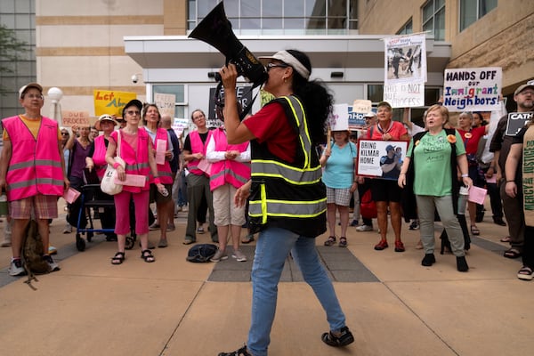 Supporters of Kilmar Abrego Garcia rally outside of the U.S. District Court in Greenbelt, Md., where a hearing was scheduled to be held on returning him to Maryland, Monday, July 7, 2025. (AP Photo/Mark Schiefelbein)