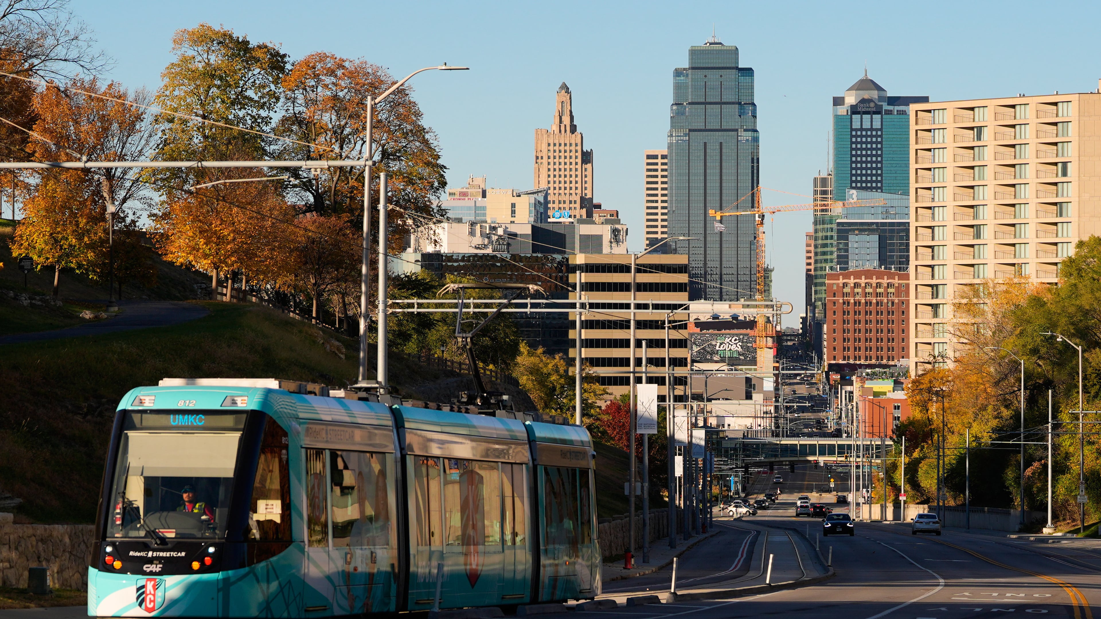 A streetcar runs along Main Street near the 18th and Vine district Friday, Nov. 7, 2025, in Kansas City, Mo. (AP Photo/Charlie Riedel)